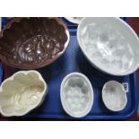 A XIX Century Brown Saltglaze Pottery Jelly Mould, moulded with plums; plus four others. (5)
