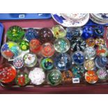 Over Thirty Paperweights, varying designs including flower, millefiori, bubble, fish and butterfly