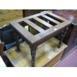 A Circa 1900 Mahogany Luggage Stand, rectangular top on ring carved tapering legs.