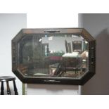 An Early XX Century Oak Framed Mirror, of canted rectangular form with beadwork decoration and
