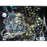 Assorted Costume Jewellery, including beads, bangles, etc:- One Box