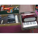 A Primi Passi Student Piano Accordion (cased), a zither and two harmonicas. (4)