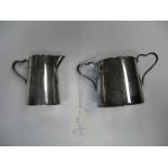 A Matching Hallmarked Silver Twin Handled Sugar Bowl and Cream Jug, each of plain tapering