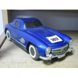 A Tinplate Friction Drive Model of a Mercedes Gullwing, in blue.