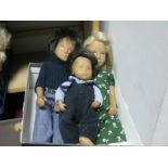 Three 1970's Sacha Dolls, Girl and Boy baby, in original clothing.