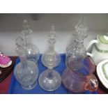 A XIX Century Pair of Decanters; together with other decanters and a water jug.