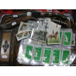 Daggers, money box, cigarette cards; together with a 1920's oak tray with chrome mounts.