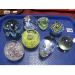 Eight Paperweights to inlcude Caithness 'Pebble', millefiori floral inclusion, novelty hippo etc:-