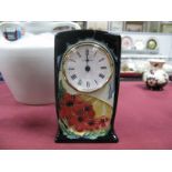 A Moorcroft Pottery Clock, decorated in the Forever England pattern, designed by Vicky Lovatt, shape