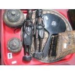 A Copper Pierced Wall Plate, possibly Indian, pair of African figures, two hardwood jars and