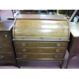 A XX Century Mahogany Bureau, with a cylinder fall and fitted interior over three long drawers, on