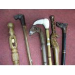 XX Century Walking Sticks, tops with a carved head of Hippo, Elephant, Goats head, with other sticks