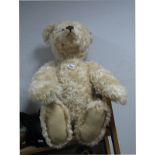A Modern Steiff Bear, blond plush, length 67cm, with associated bag 'North American Exclusive