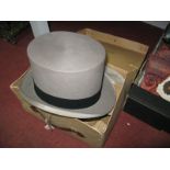 A Grey Top Hat, by Dunn & Co, gloves, etc, in original card box.