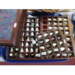 A Collection of Thimbles, three display racks and a wooden jewellery box.