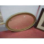 A XX Century Oval Shaped Painted Gilt Wall Mirror, with cable decoration, bevelled mirror.