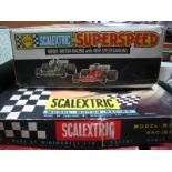 A 1960's Scalextric Set FJ31, with two cars boxed and a 1970's set No C547 'Superspeed' with two