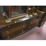 A Stag Dressing Table, with four small drawers, over four long drawers, on square legs, together