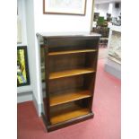 A Mahogany Bookcase, with three shelves reeded sides, on a stepped plinth base.