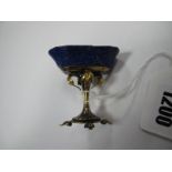 A Late XIX Century Table Salt, the blue hardstone fluted oval bowl raised on a gilt metal foliate