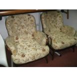 Two Ercol Armchairs, with upholsted backs, arms and seats.