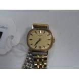 Longines: A 9ct Gold Ladies Wristwatch, the signed dial with gold baton markers, to a gold plated