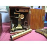 Lacquered Brass Microscope, on 'Y' shaped iron cradle, with lens and slides in mahogany case, no