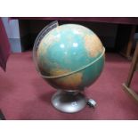 A 1966 'Illumina' World Globe, on metal stand by Purvell & Sons Ltd London, approximately 55mm