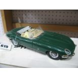 A Boxed Franklin Mint 1:24th Scale Diecast Model 1961 Jaguar E-Type, accompanied by literature.