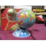 A Post War Clockwork Tinplate Globe, with orbiting Sputnik and Spacecraft. Made in Western