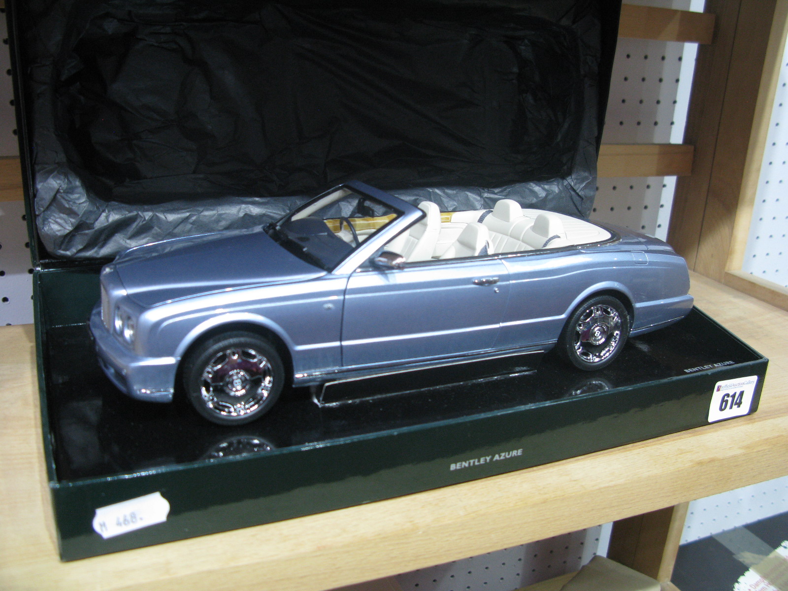 A Minichamps 1:18th Scale Diecast Model #BL472 Bentley Azure 'Fountain Blue', displayed in Bentley