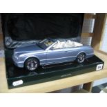 A Minichamps 1:18th Scale Diecast Model #BL472 Bentley Azure 'Fountain Blue', displayed in Bentley