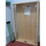 A Glass Fronted Display Cabinet with Lockable Doors and Ten Glass Shelves, 110cm tall, 68cm wide,