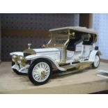 A Franklin Mint Model of a 1911 Rolls Royce Tourer, appears complete, boxed with paperwork.