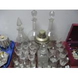 Four Decanters, dimpled glass, cocktail shaker, drinking glasses.