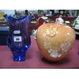 A Blue and Amethyst Mid XX Century Triform Glass Vase, 21.5cm high, mottled orange glass ornament.