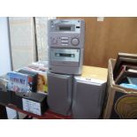 A Sharp Mini Hifi System, a quantity of CD's and DVD's (2) (Untested sold for parts Only)