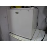 A Haier Mini Fridge.