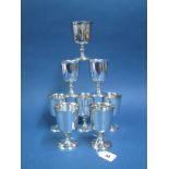 A Set of Eight Hallmarked Silver Goblets, FH, Birmingham 1973, each of plain form with feature