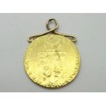 A George III Guinea, 1790, applied pendant mount, polished, plugged.