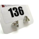 A Pair of Modern 18ct White Gold Diamond Set Earstuds, each claw set with three uniform brilliant