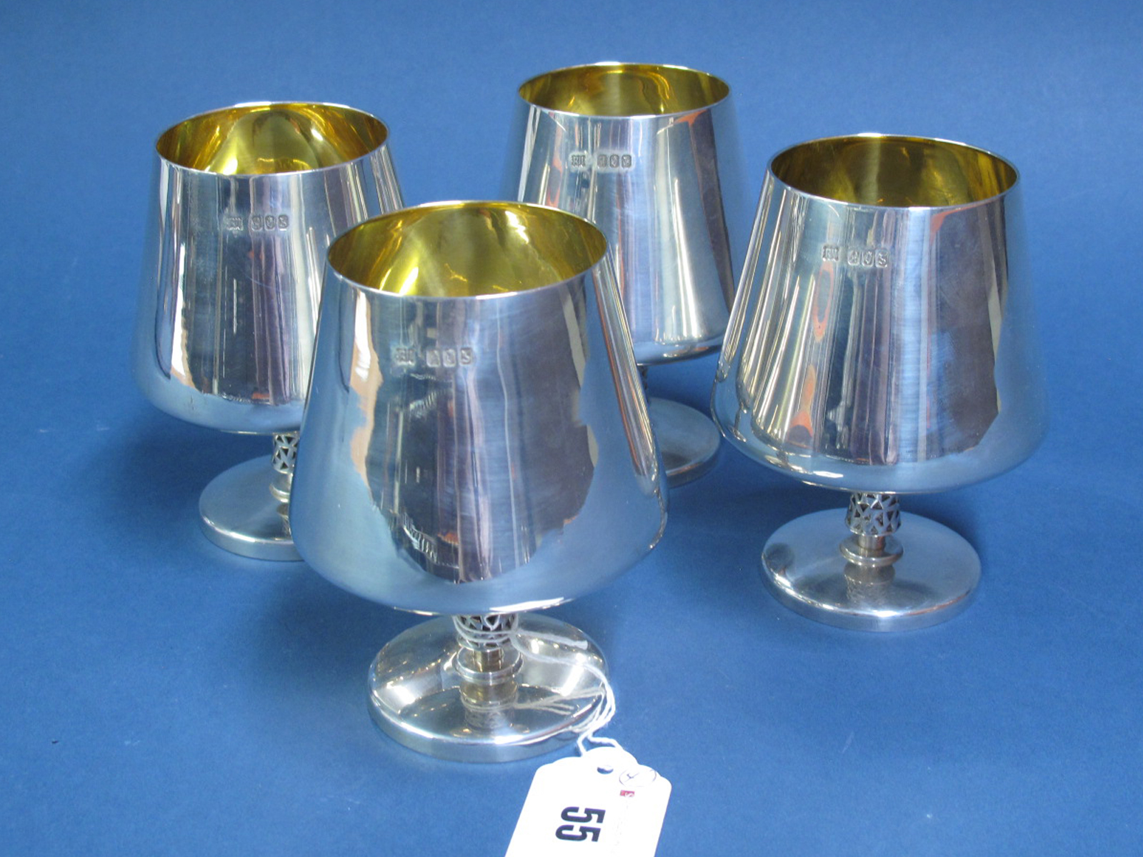 A Set of Four Irish Hallmarked Silver Goblets, RII, Dublin 1974, each of tapering cylindrical