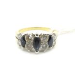 A Modern Sapphire and Diamond Set Dress Ring, claw set with three graduated marquise cut