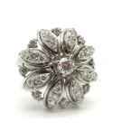 An 18ct White Gold Diamond Set Cocktail Ring, of flowerhead design, set throughout with graduated