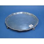 A Hallmarked Silver Salver, BBSLd, Birmingham 1932, of plain shaped circular form with gadrooned