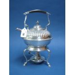 An Electroplated Tea Kettle on Burner Stand, of semi reeded form on plain scroll base, with