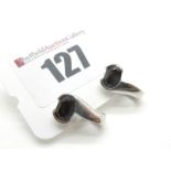 A Pair of Modern Garnet Set Earrings, each oval semi collet rubover set, to hinged back, stamped "