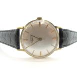 Longines; A 9ct Gold Cased Gent's Wristwatch, the signed dial with baton markers and centre seconds,