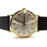 Garrard; A 9ct Gold Cased Automatic Gent's Wristwatch, the signed dial with baton markers, date