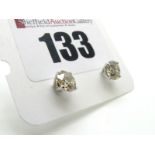 A Pair of 18ct White Gold Single Stone Diamond Earstuds, each brilliant cut stone four claw set,